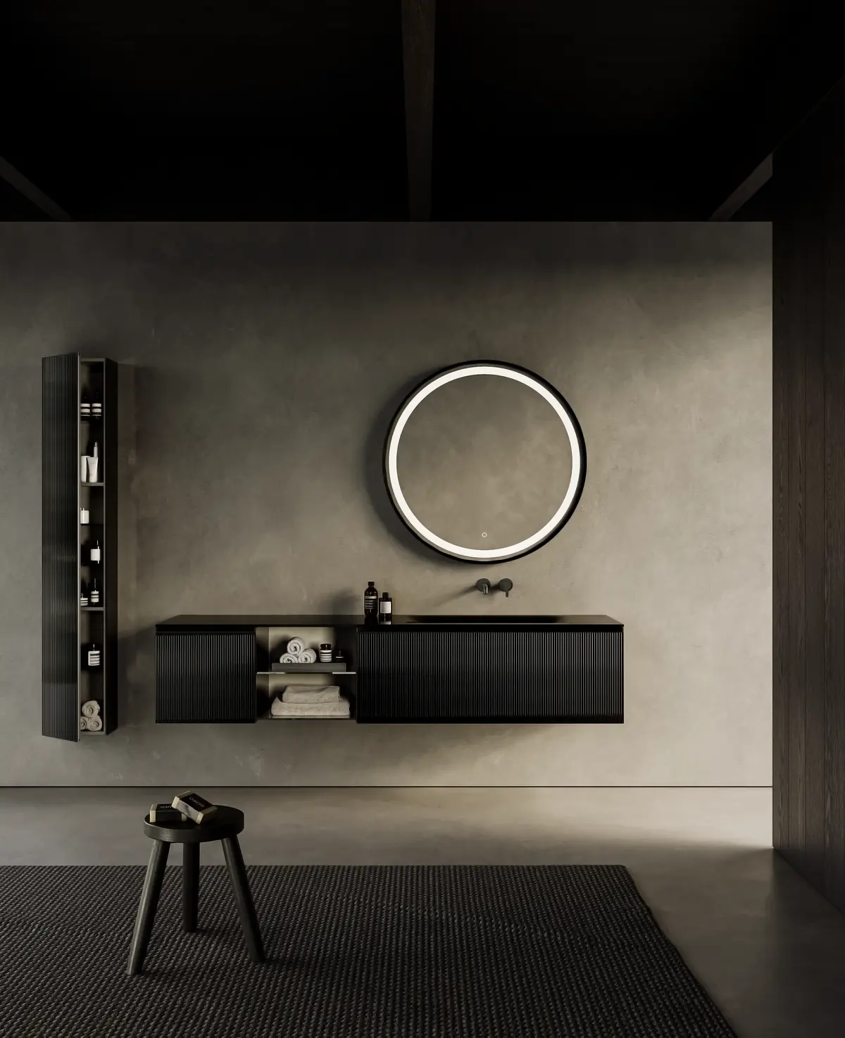 Baño en gris oscuro con mueble de lavabo negro de Artelinea, espejo redondo iluminado y columna de estantes